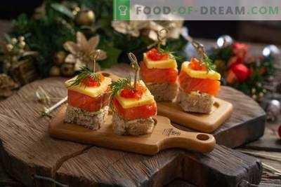 Canapes with salmon for a festive buffet table